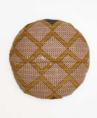 brown and yellow round throw pillow handmade using recycled vintage fabrics 