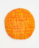 orange and yellow siwrly round throw pillow made of vintage fabrics 