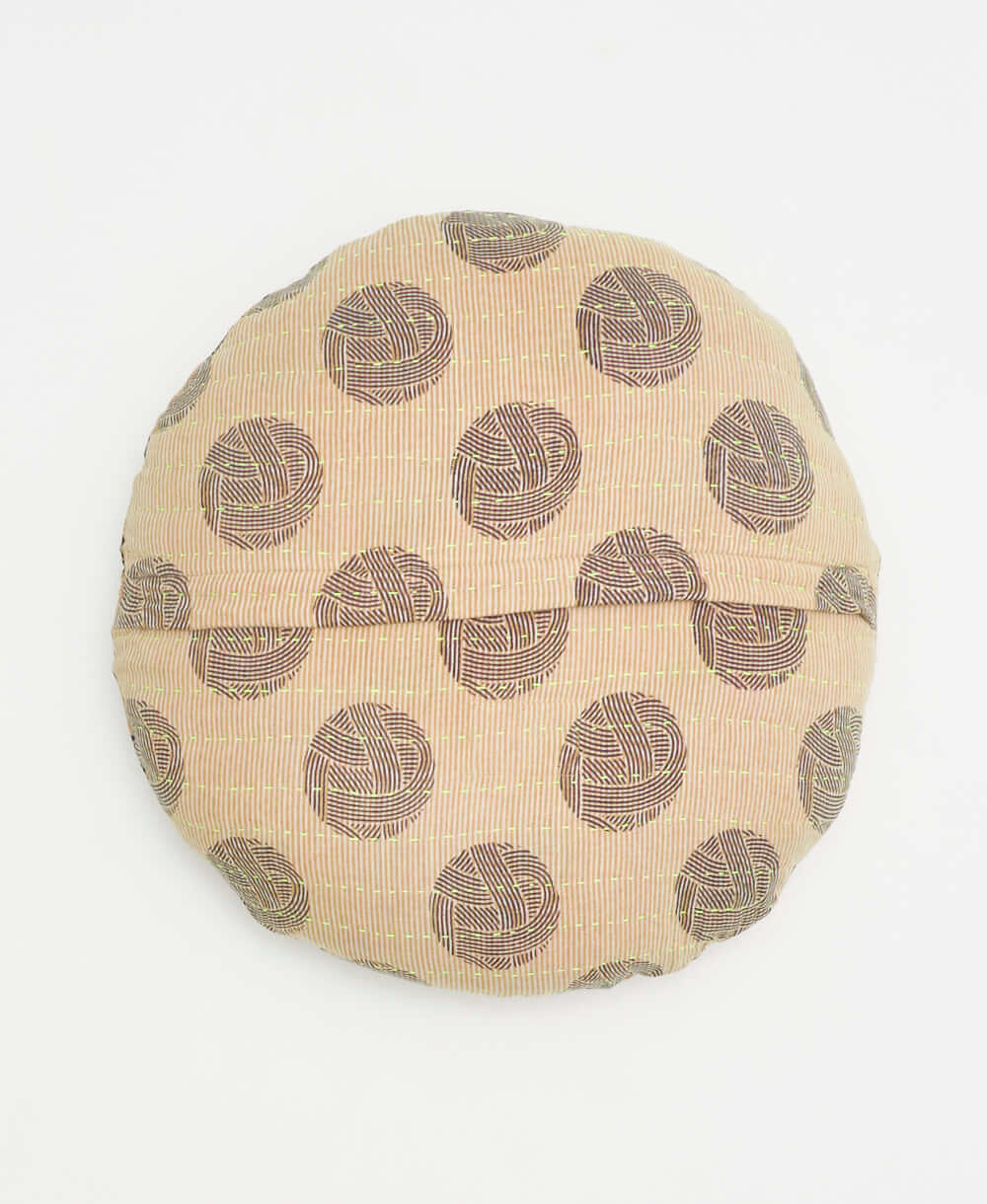 tan and black round throw pillow with a circle pattern handmade using vintage fabrics 