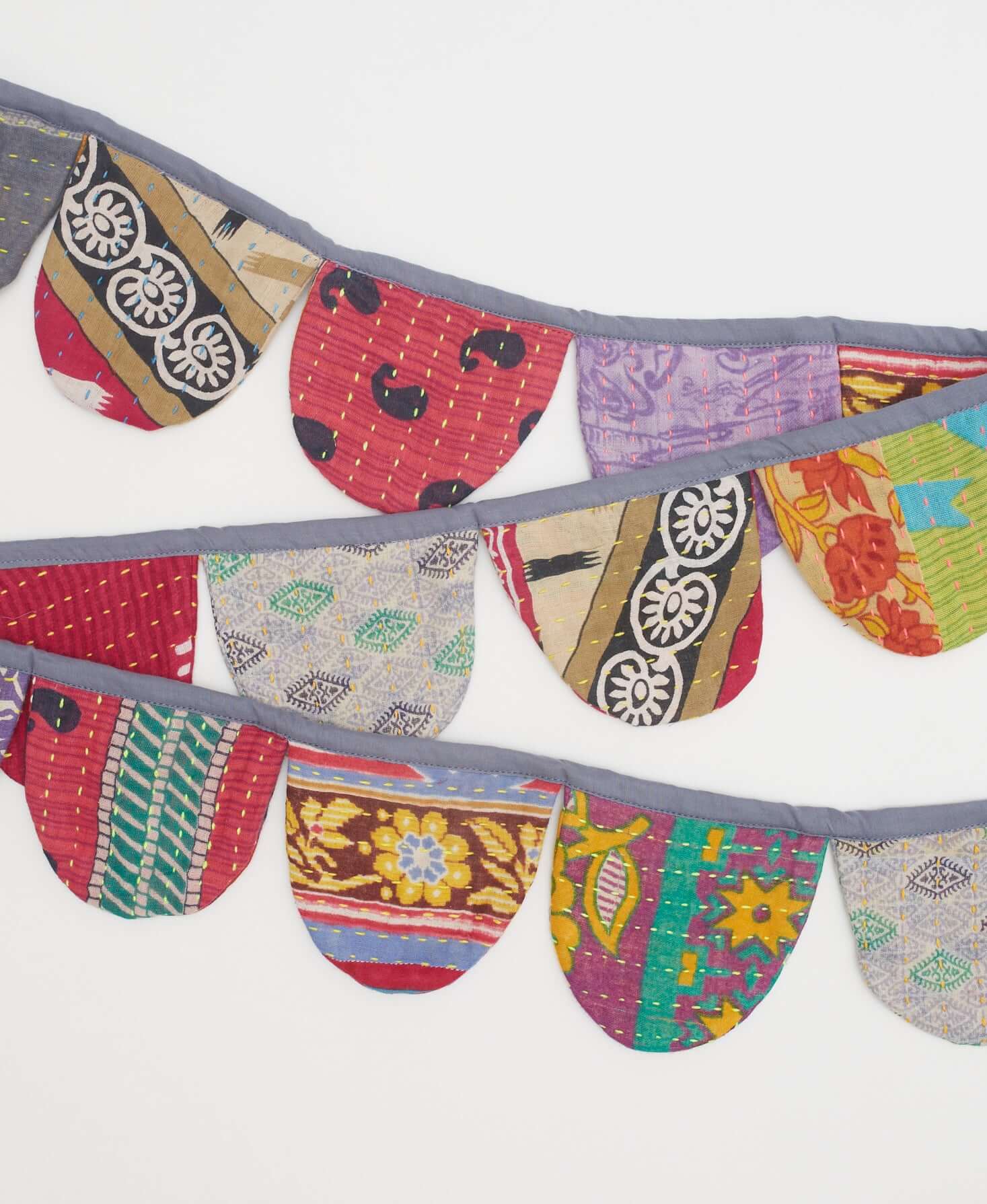 eco-friendly bunting flag in bold mismatched colors made from upcycled scrap materials