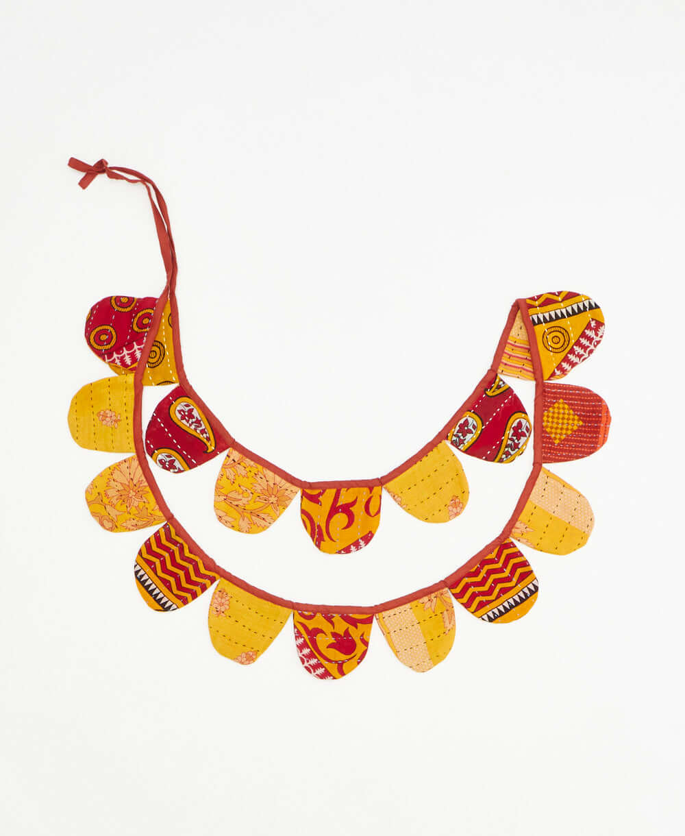 upcycled fabric garland with bold yellow geometric floral pattern by Anchal