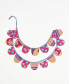 upcycled fabric garland with bold pink and purple abstract pattern by Anchal