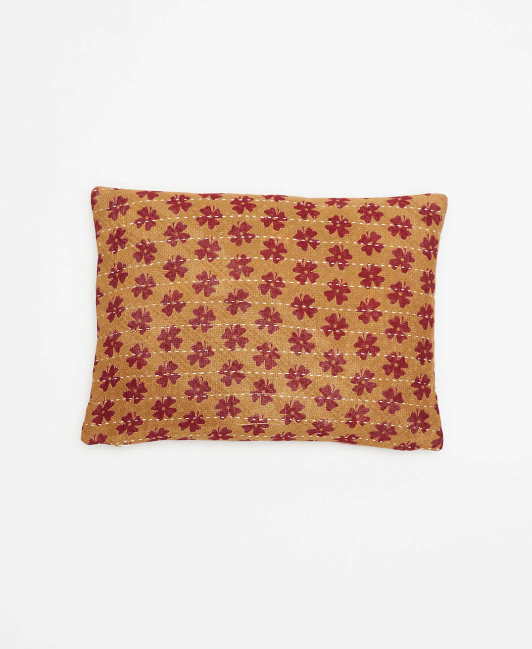 sustainably made small accent pillow in tan with crimson red flowers