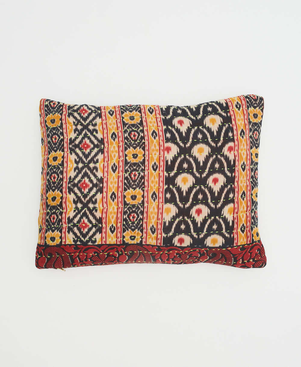 sustainably made small lumbar pillow in black & yellow ikat print made from vintage saris in India