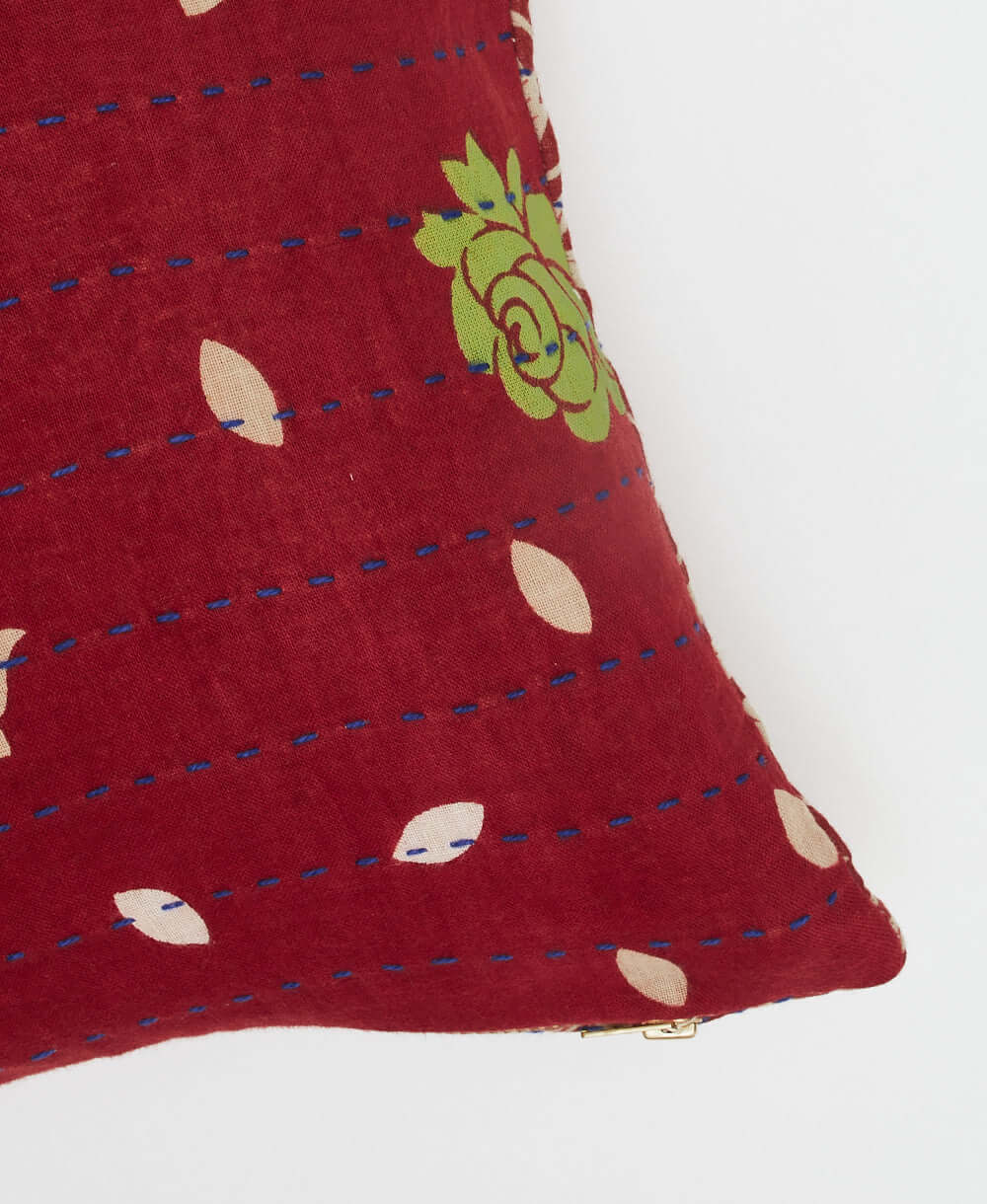 cobalt blue kantha stitching on small throw pillow in cherry red with bold lime green & white rose print