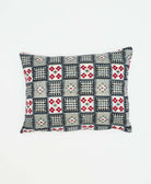 small lumbar pillow in bold black & grey checkered design with red pattern accents