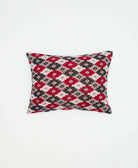 small decorative pillow in black, grey and red abstract design made from vintage cotton fabric