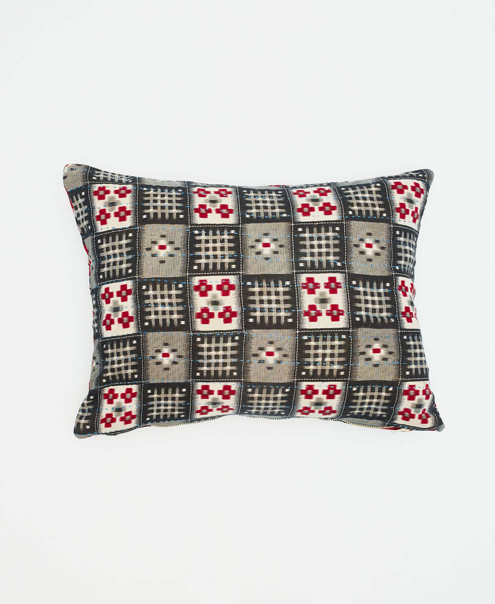 small pillow with black, white and red checker design made from upcycled vintage saris in India