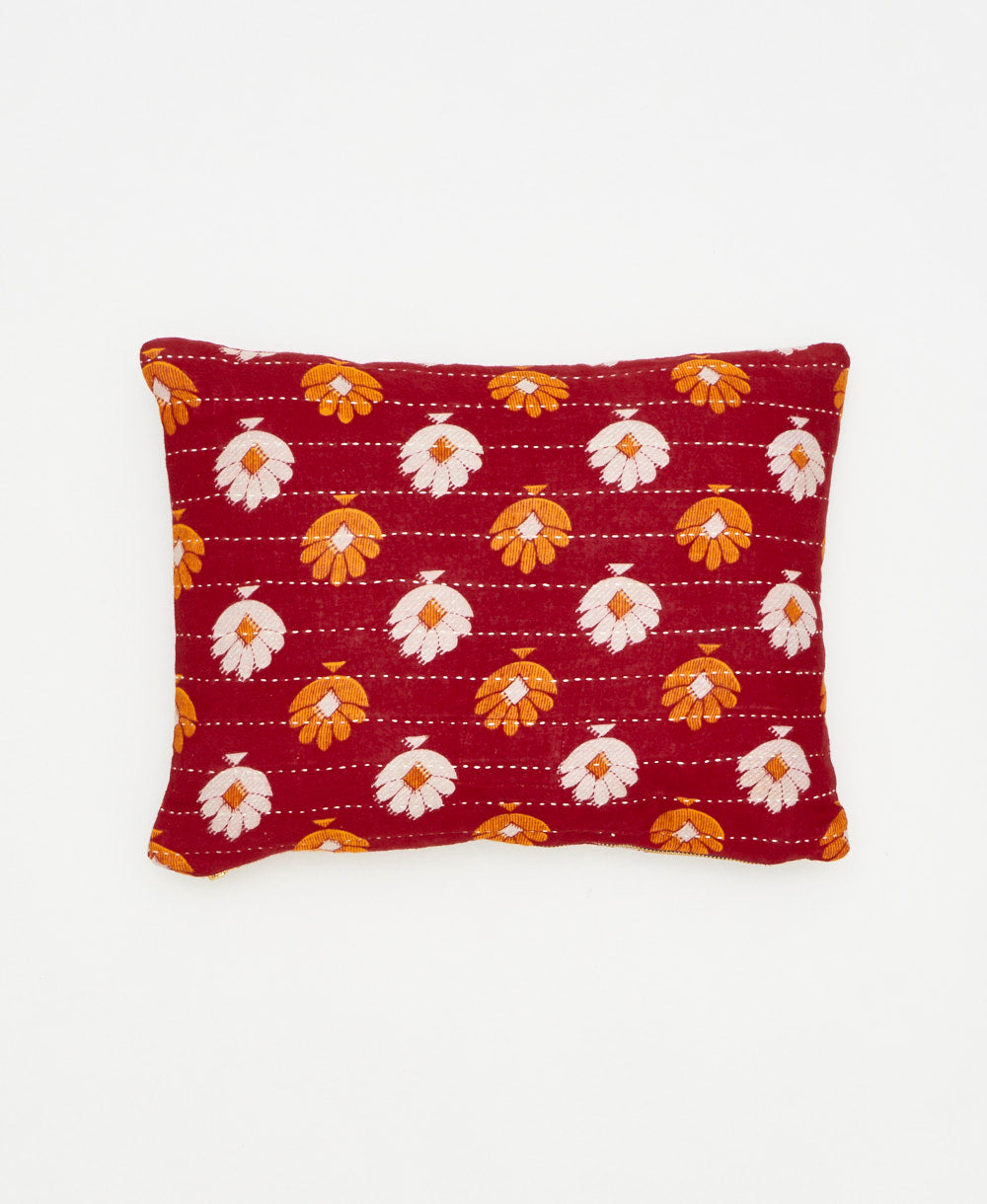 orange and white floral print small  throw pillow with a removable down insert 