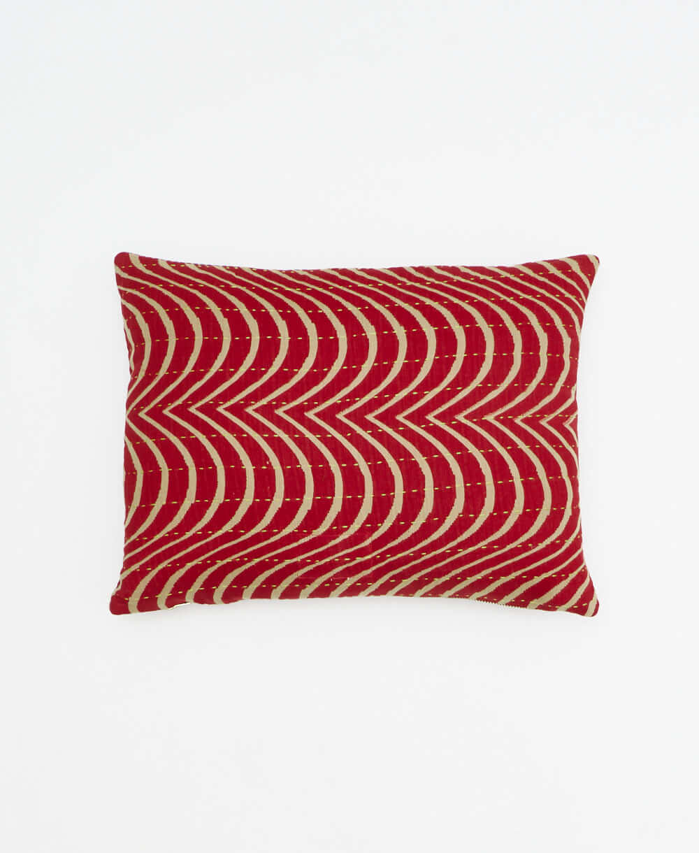 small lumbar pillow in scarlet red with tan wavy print with removeable down feather insert