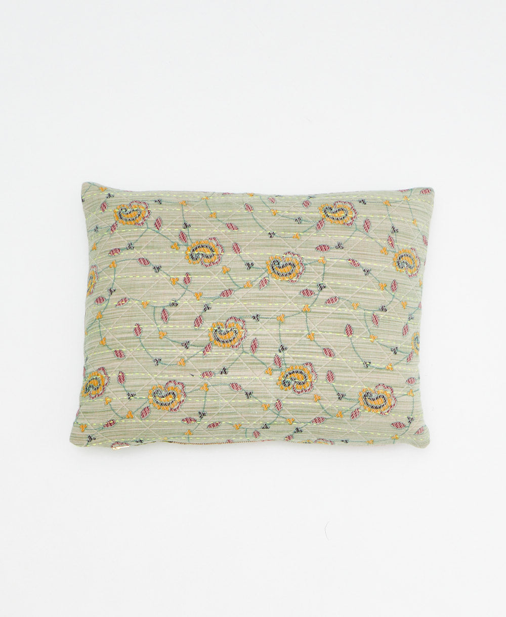 small lumbar pillow in sage green with yellow paisley print with removeable down feather insert