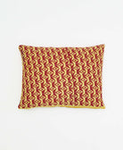 small lumbar pillow in brick red with pastel yellow diamond print with removeable down feather insert