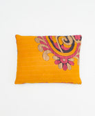 small lumbar pillow in orange with pink abstract print with removeable down feather insert