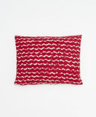 small lumbar pillow in scarlet red with white wavy print with removeable down feather insert