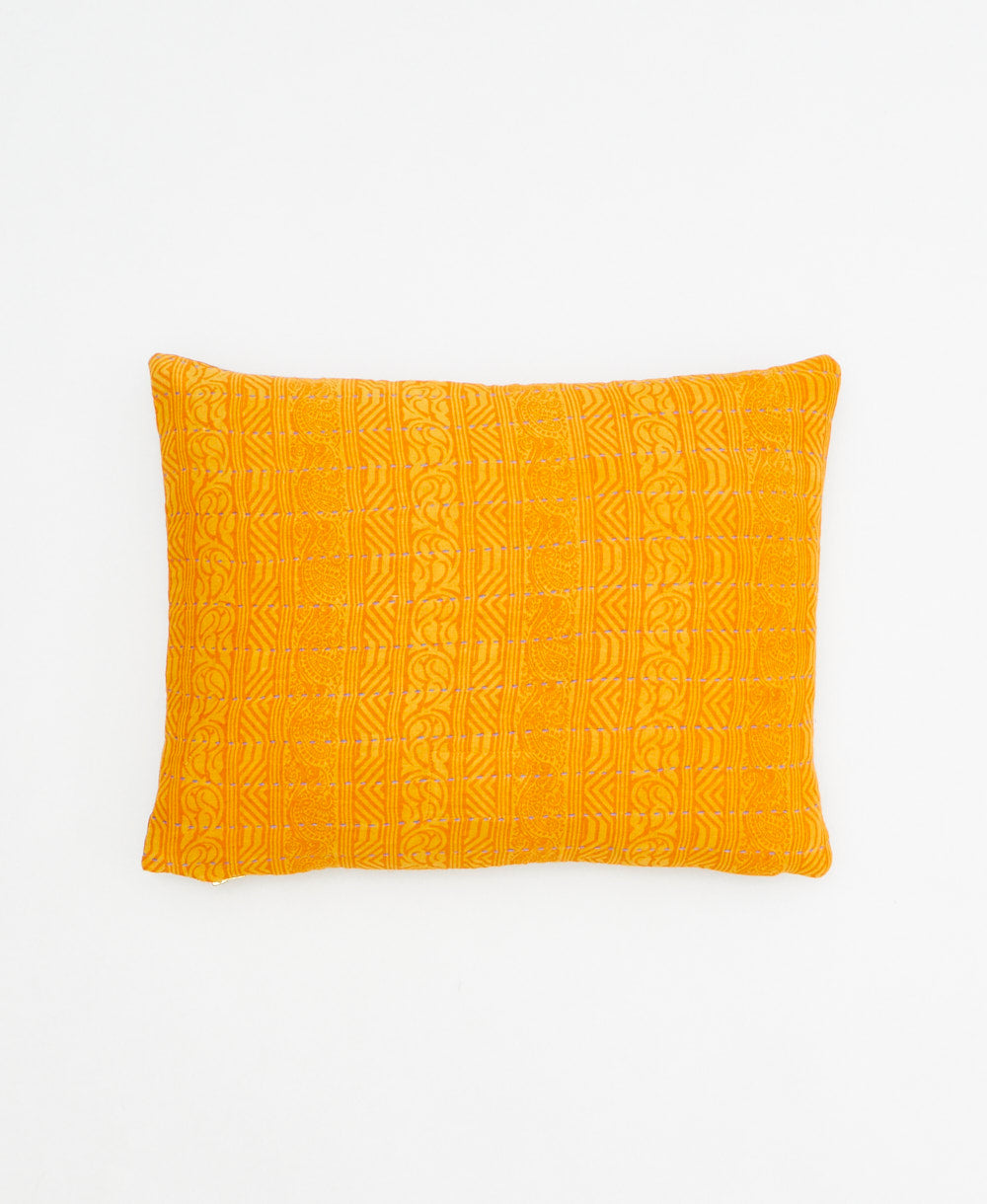 small lumbar pillow in yellow-orange with subtle orange stripes print with removeable down feather insert