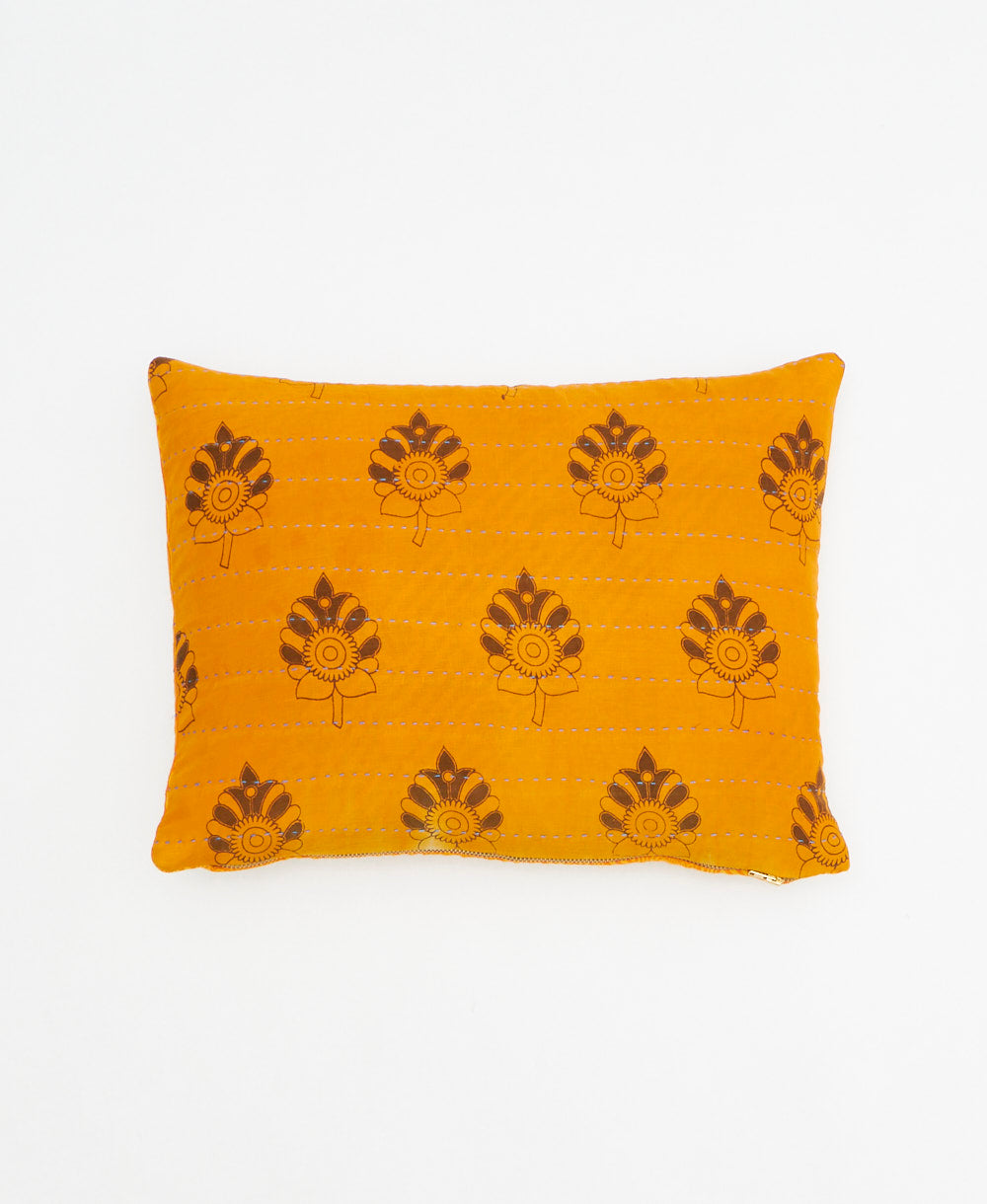 light orange small pillow with bold brown floral print handmade in India from vintage cotton fabrics