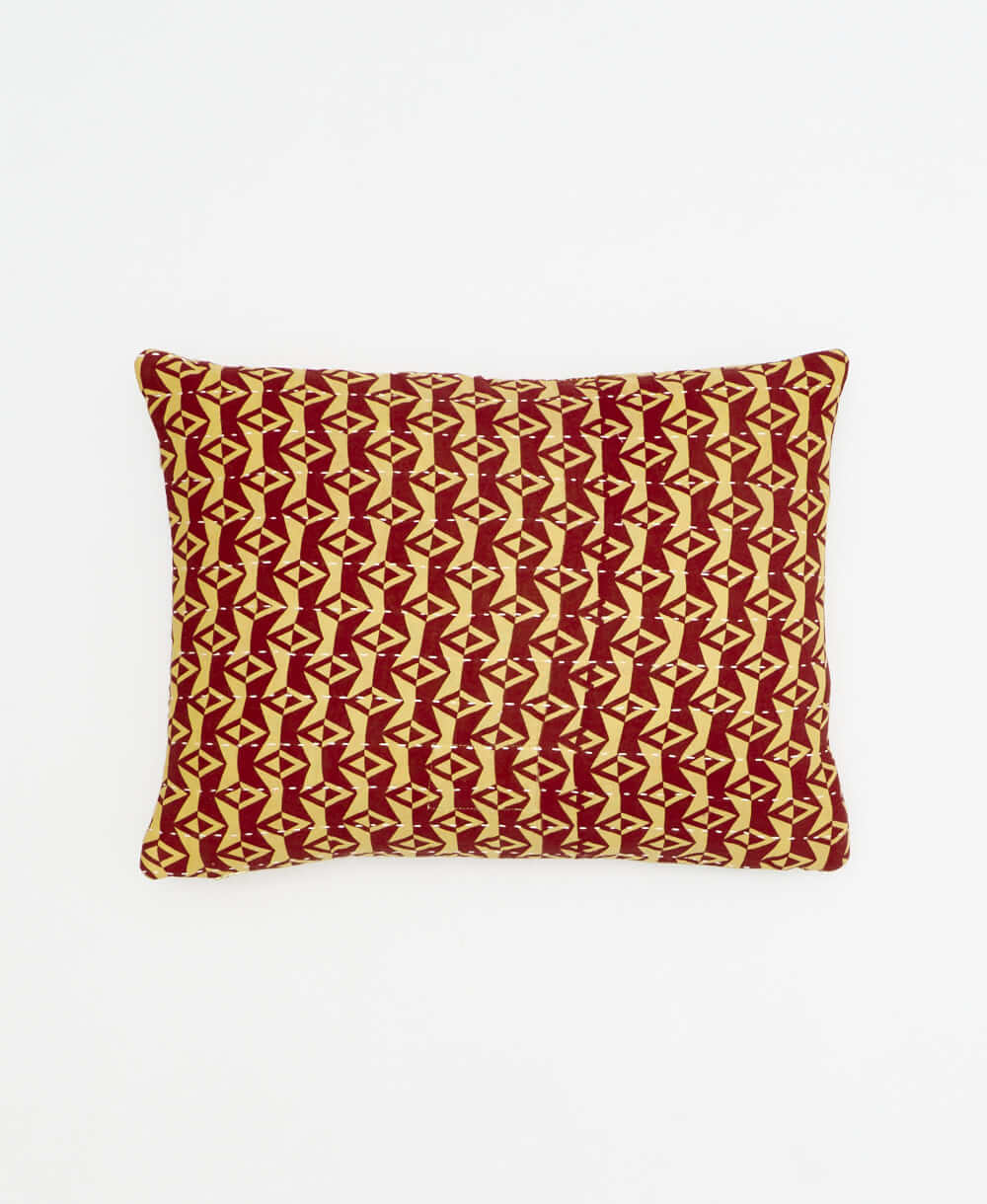 small lumbar pillow in brick red with tan diamonds print with removeable down feather insert