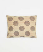 small lumbar pillow in sand with black circular print with removeable down feather insert