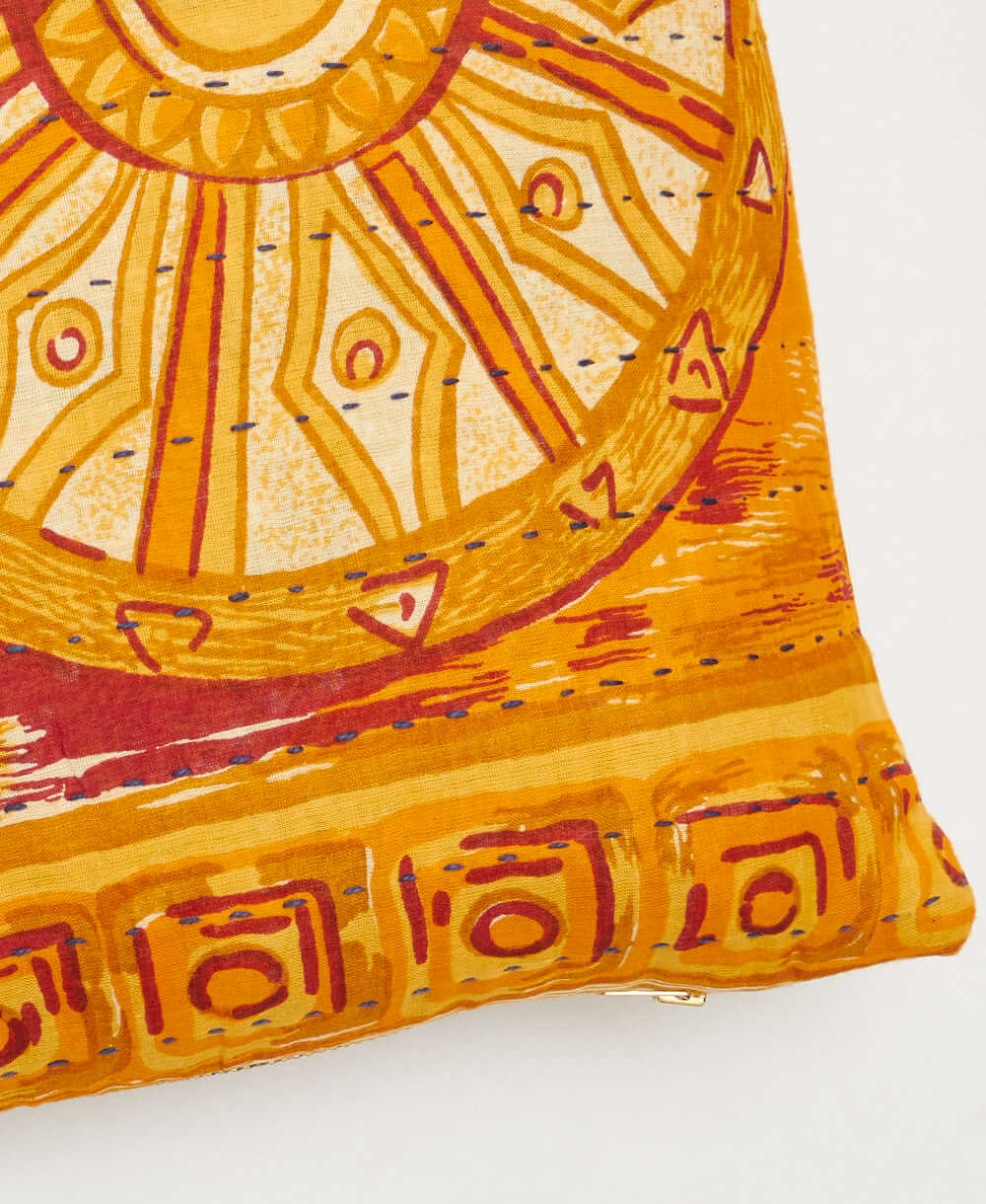 grey kantha embroidery on yellow-orange small throw pillow with red medallion print