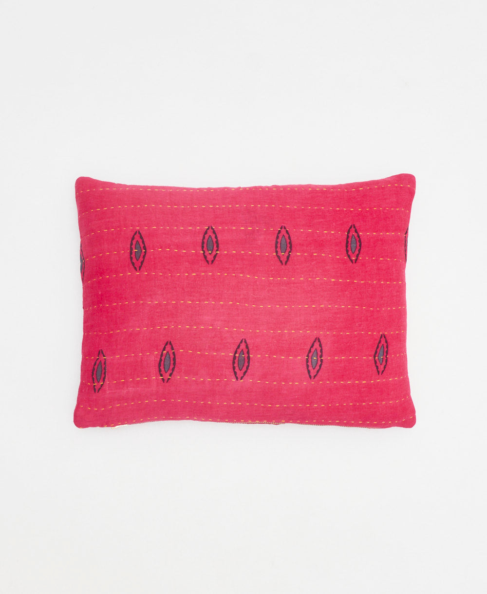 small lumbar pillow in hot pink with white abstract floral print with removeable down feather insert