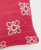 yellow kantha embroidery on hot pink small throw pillow with white floral print