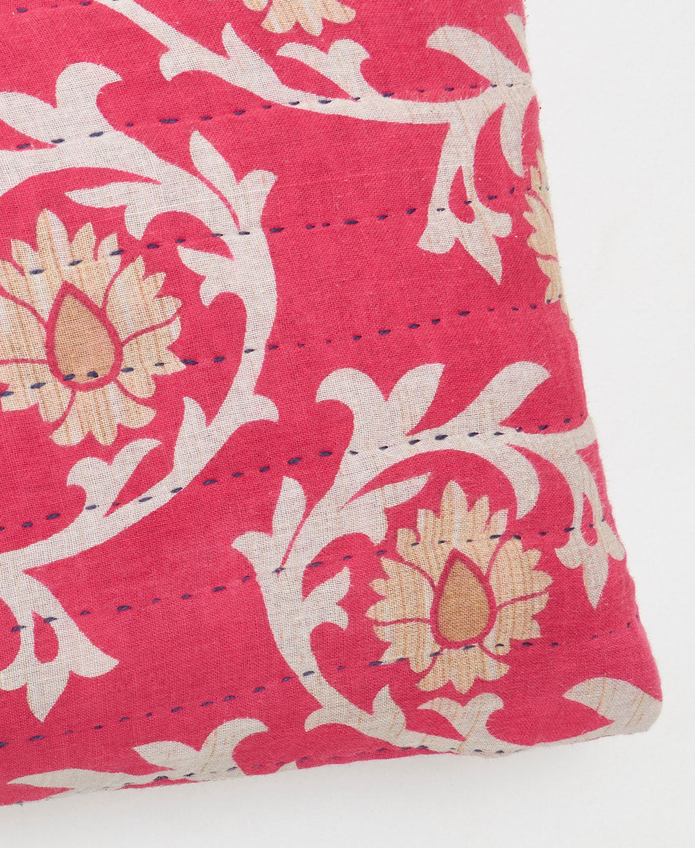 black kantha embroidery on hot pink small throw pillow with tan and white floral print