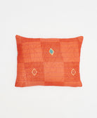 small lumbar pillow in coral with teal diamond print with removeable down feather insert