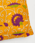 pink kantha embroidery on orange small throw pillow with a bold floral print