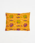 orange small pillow with purple and tan floral print handmade in India from vintage cotton fabrics