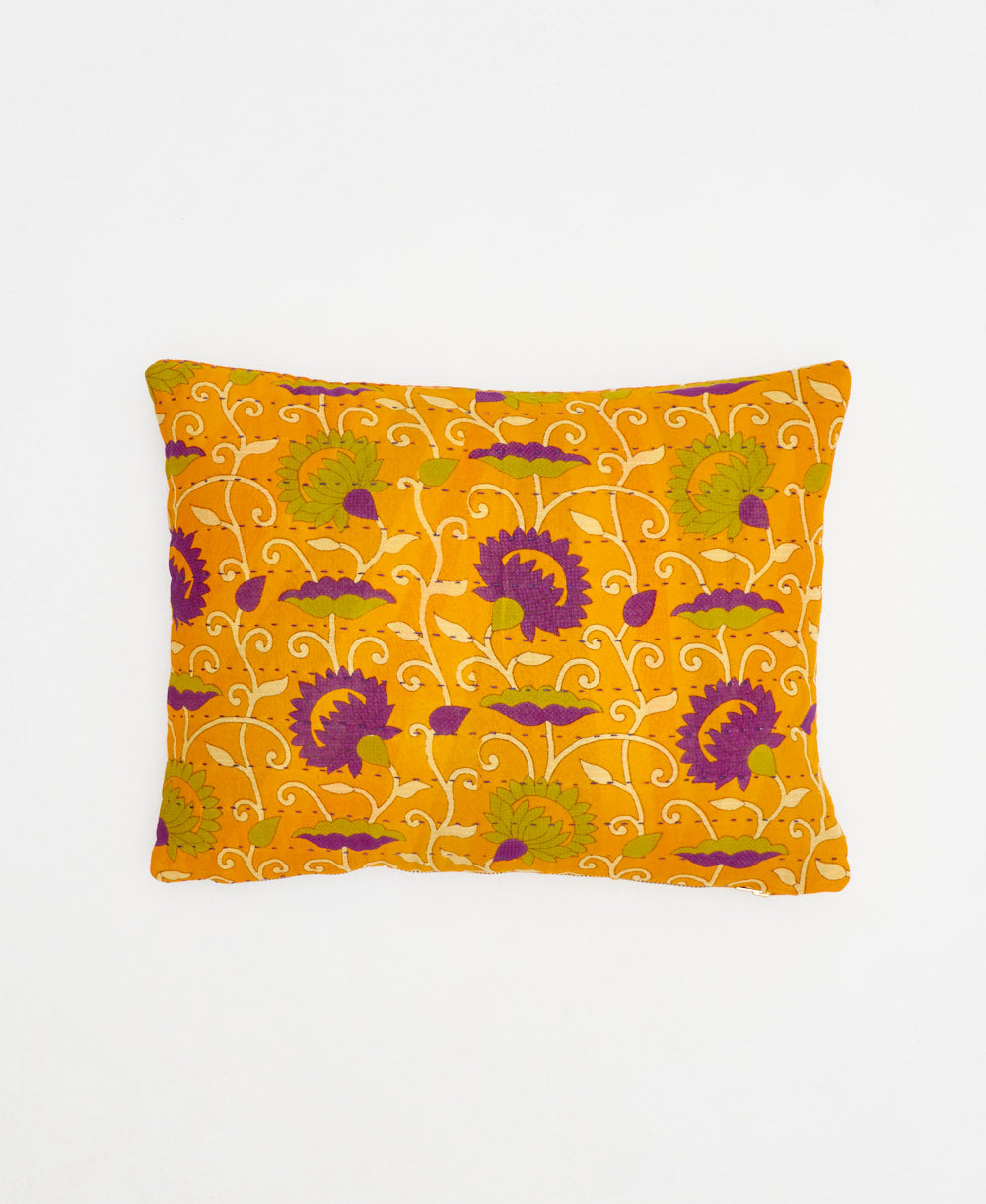 orange small pillow with purple and lime green floral print handmade in India from vintage fabrics