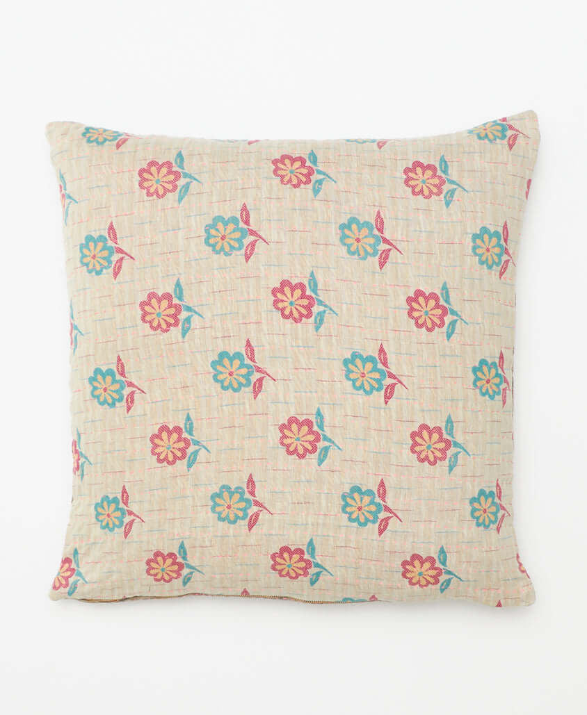 light grey square pillow with bright blue & hot pink flowers made in India