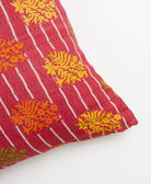 hand-embroidered square pillow in one-of-a-kind red floral pattern