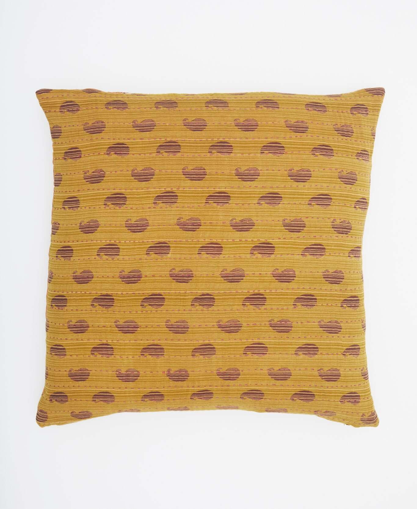 muted yellow square pillow with maroon paisley design