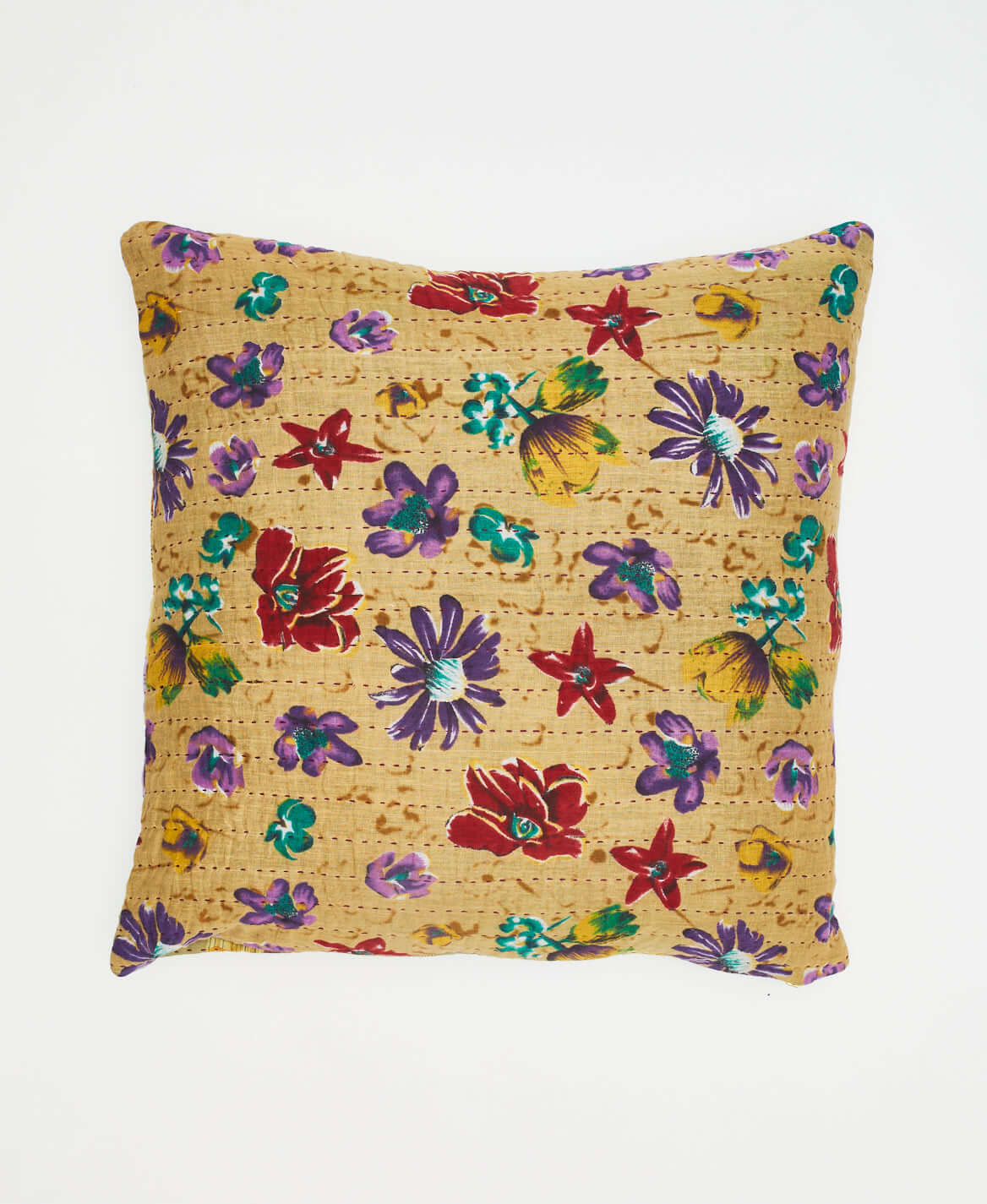 tan floral throw pillow with red, purple & yellow graphic flowers