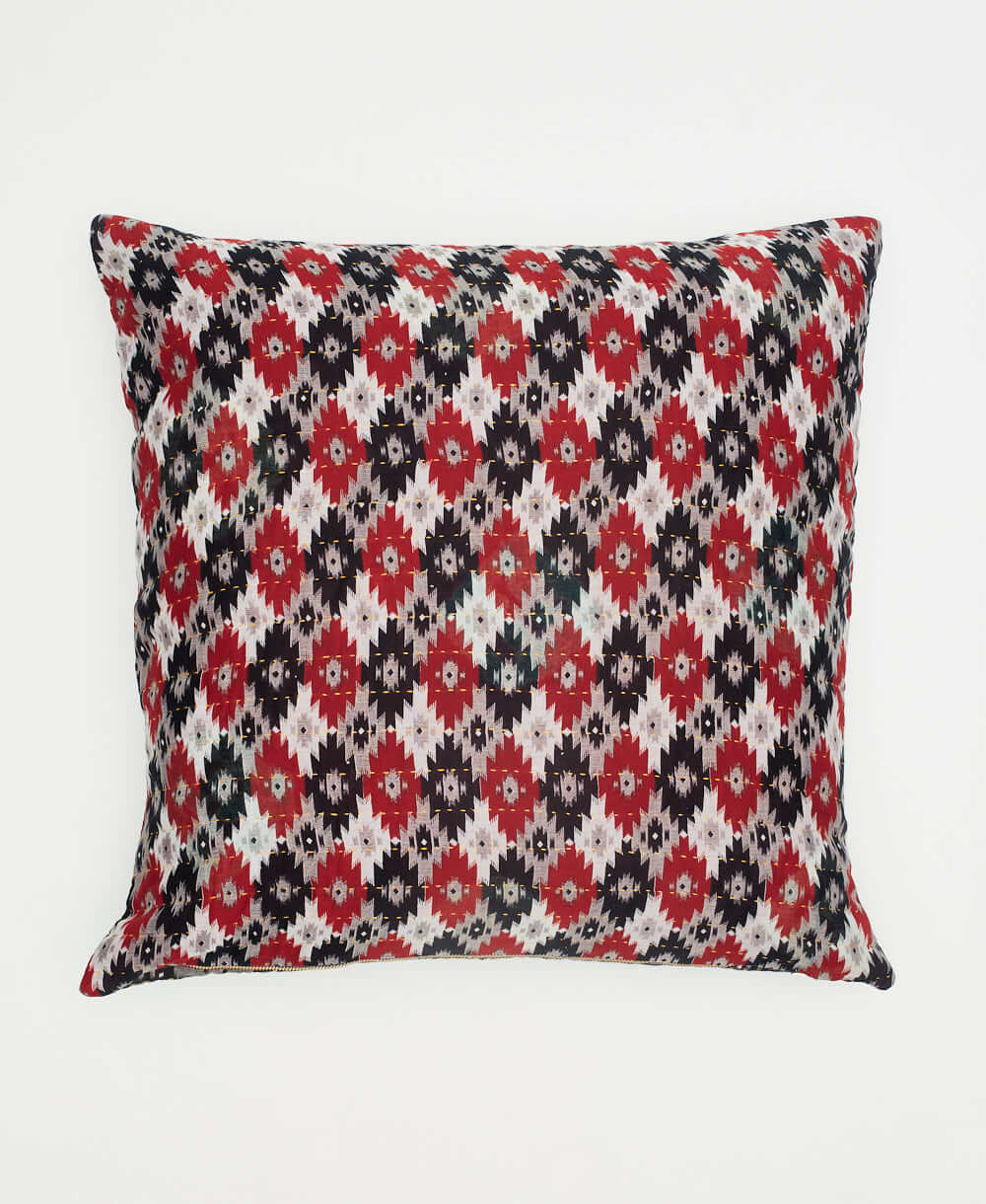 black, white and red abstract diamond patterned square pillow with reversible prints on each side