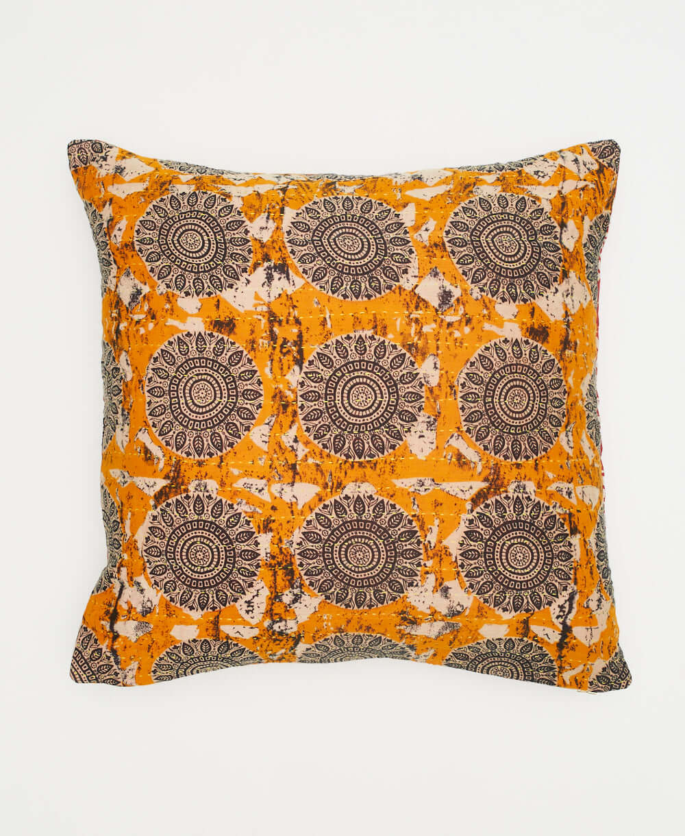 orange throw pillow with black and white medallions handmade from vintage cotton fabrics from India