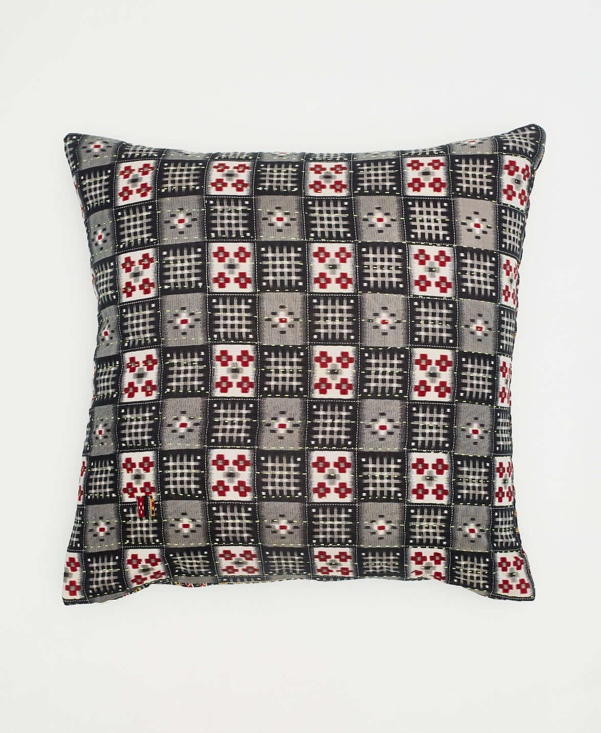 black and grey checkered boho throw pillow with red accents made in a Fair Trade environment