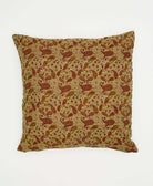 tan square pillow with maroon and olive green paisley pattern with reversible prints on each side