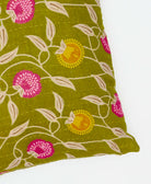 square pillow featuring a floral design and traditional kantha hand stitching 