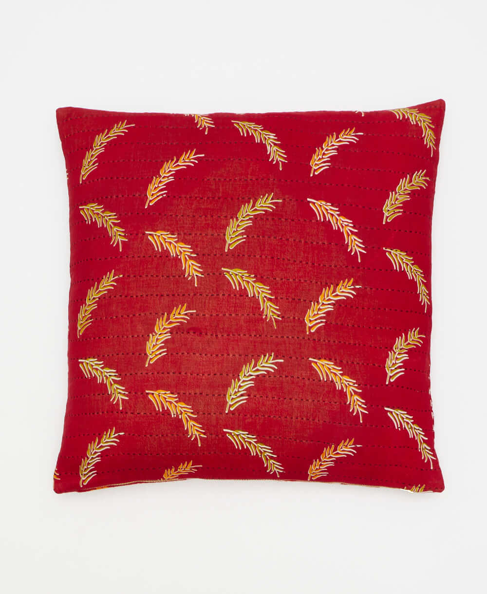 red throw pillow hand crafted by artisans in india 