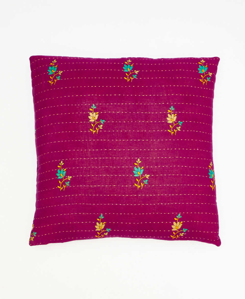 colorful throw pillow in magenta purple made from vintage fabrics with hand-stitched embroidery