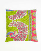 colorful throw pillow in hot pink made from vintage fabrics with hand-stitched embroidery