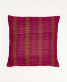 colorful throw pillow in magenta made from vintage fabrics with hand-stitched embroidery in tan floral print