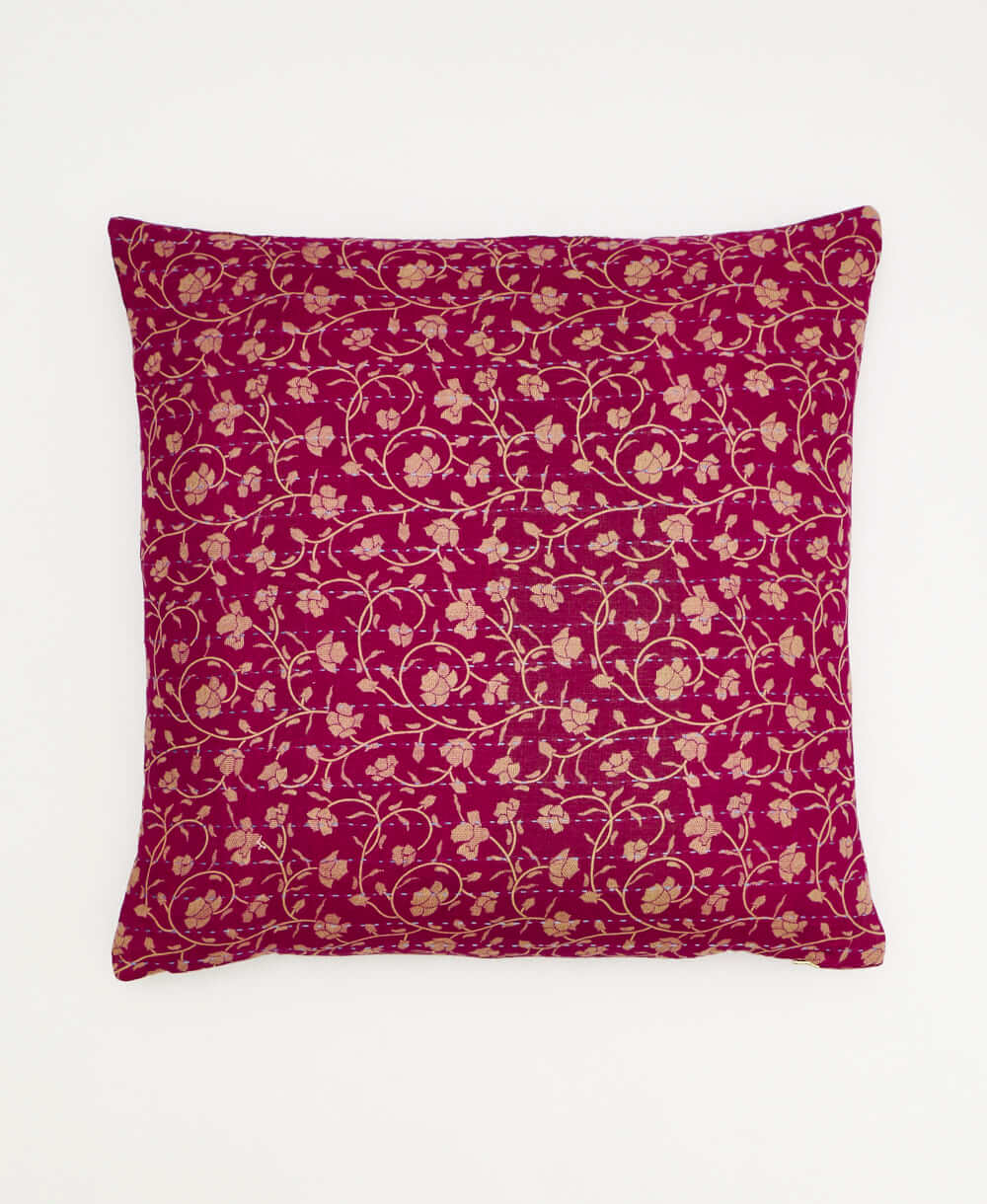 magenta throw pillow with a tan floral print made from vintage cotton saris in India