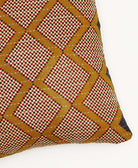 kantha square pillow in black and red with mustard chevron pattern with white embroidery