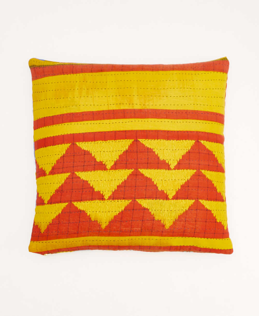 colorful throw pillow in coral made from vintage fabrics with hand-stitched embroidery in multi-colored checkered print