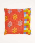 coral throw pillow with a multi-colored checkered print made from vintage cotton saris in India