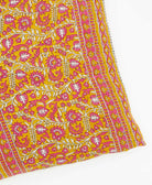 kantha square pillow in barbie pink with yellow paisley pattern with black embroidery