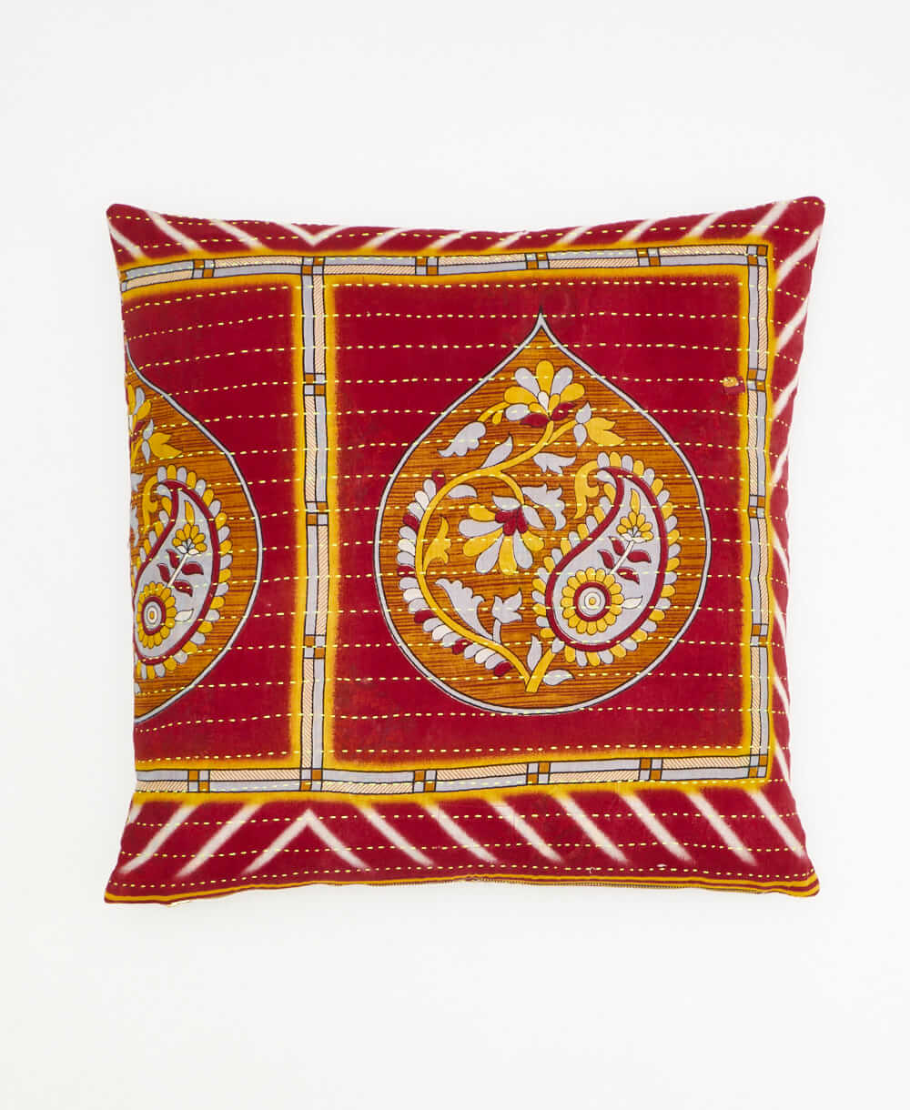 colorful throw pillow in red made from vintage fabrics with hand-stitched embroidery in yellow square print