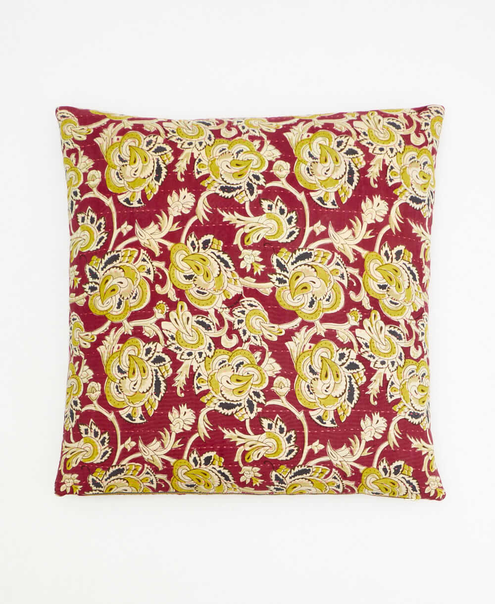 brick red throw pillow with a lime floral print made from vintage cotton saris in India